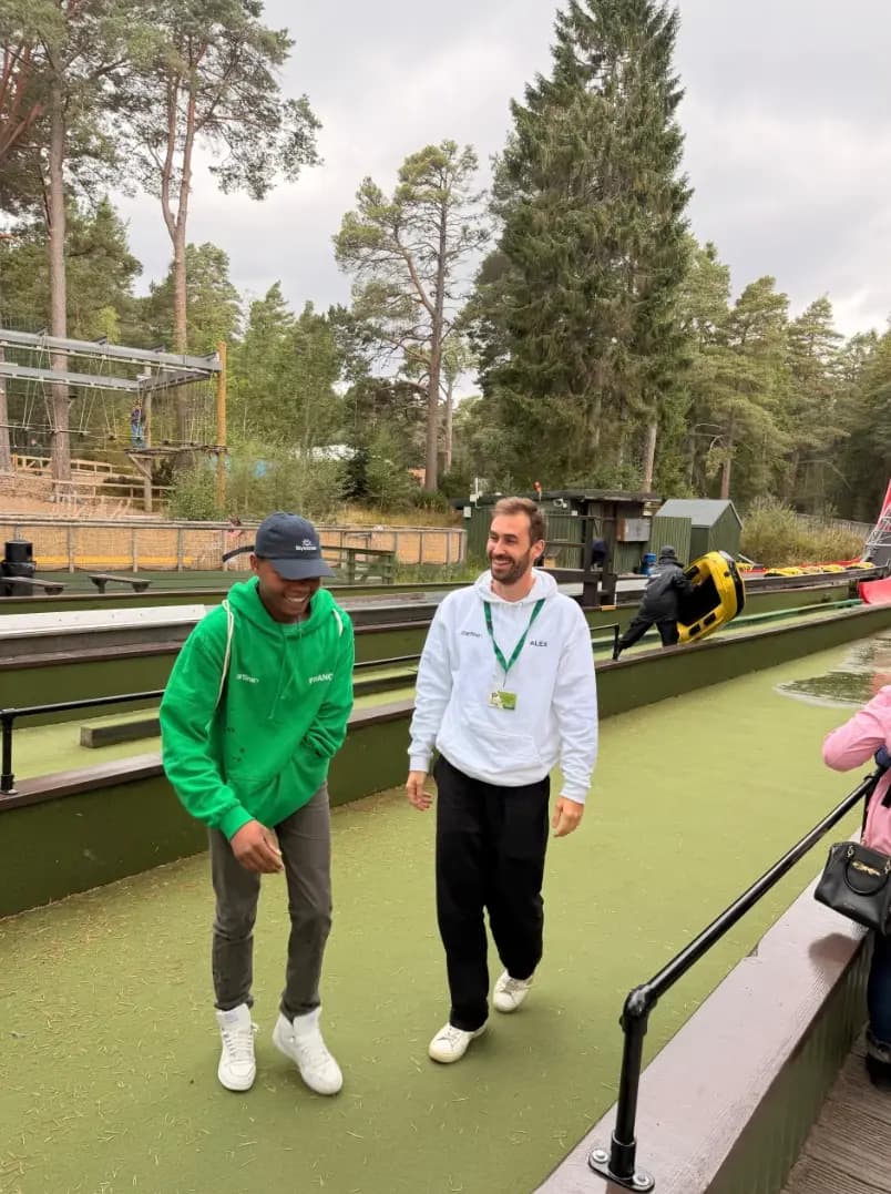 Two members of the AWARE Scotland group laughing together at Landmark Forest Adventure Park